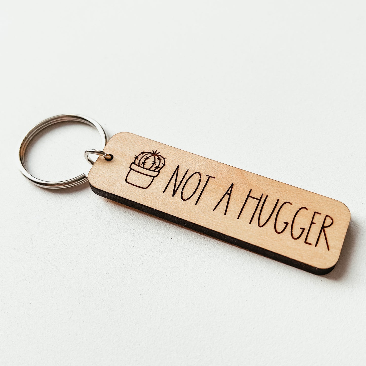 Not A Hugger Keychain