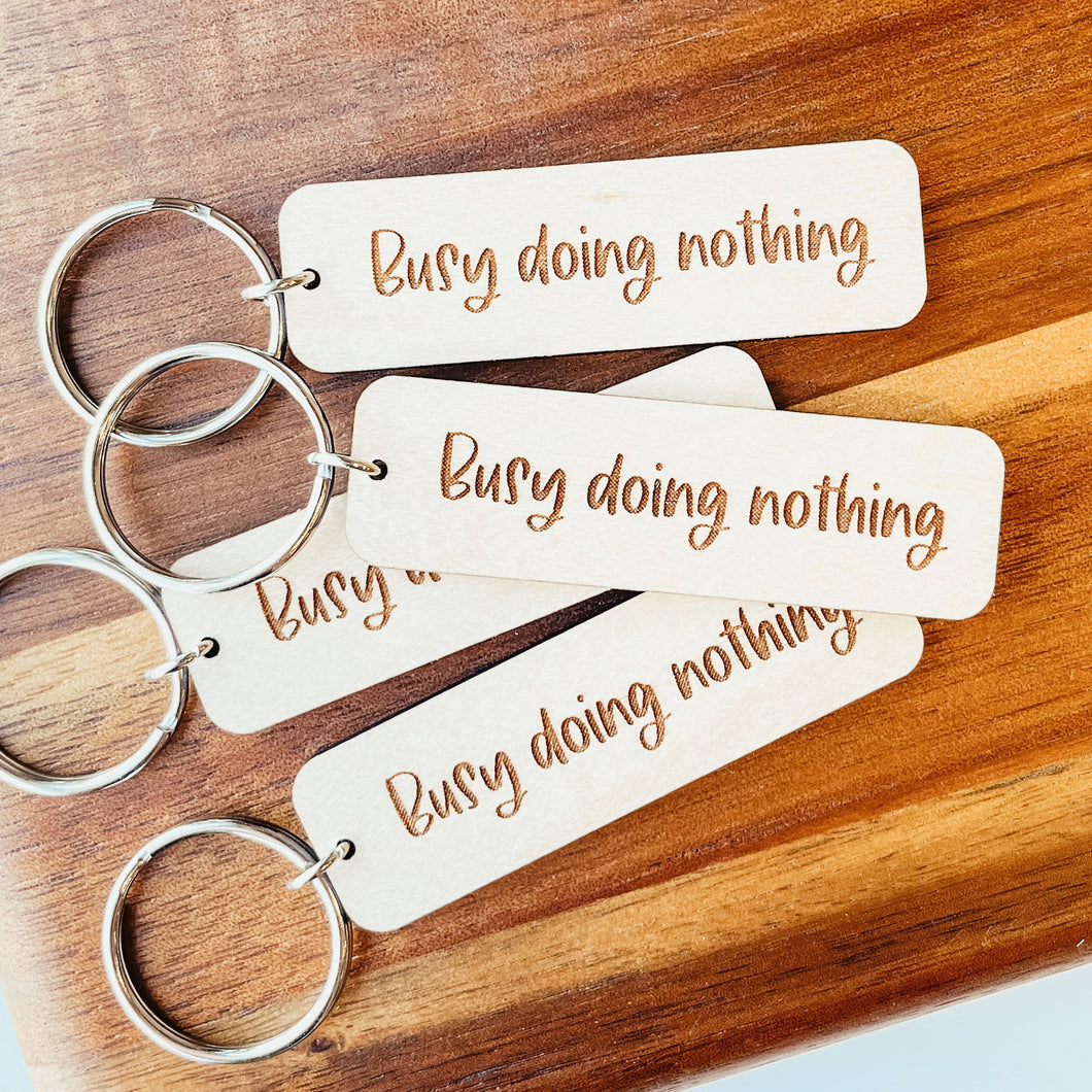 Busy Doing Nothing Keychain